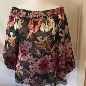 Elegant off the shoulder blouse.